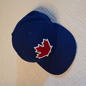 New Era Royal Blue Hat with Red Maple Leaf